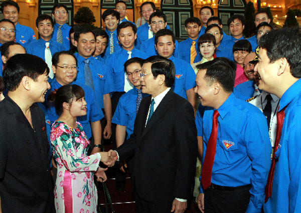 Chủ tịch nước Trương Tấn Sang với các đại biểu  Ảnh: Nguyễn Khang TTXVN