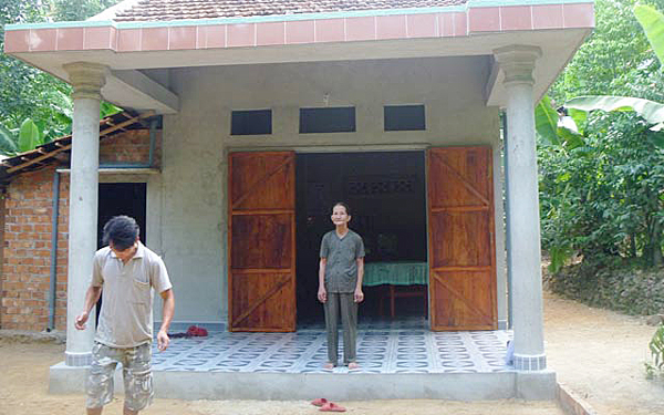 Nhờ hỗ trợ từ chương trình 167 và vốn vay, bà Trần Thị Long đã xây dựng ngôi nhà kiên cố