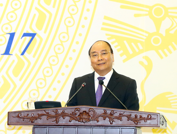 Đồng chí Nguyễn Xuân Phúc - Uỷ viên Bộ Chính trị, Thủ tướng Chính phủ phát biểu tại Hội nghị