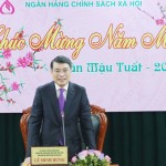 Đồng chí Lê Minh Hưng - Ủy viên BCH TW Đảng, Thống đốc NHNN Việt Nam kiêm Chủ tịch HĐQT NHCSXH phát biểu tại buổi gặp mặt đầu Xuân năm mới Mậu Tuất 2018