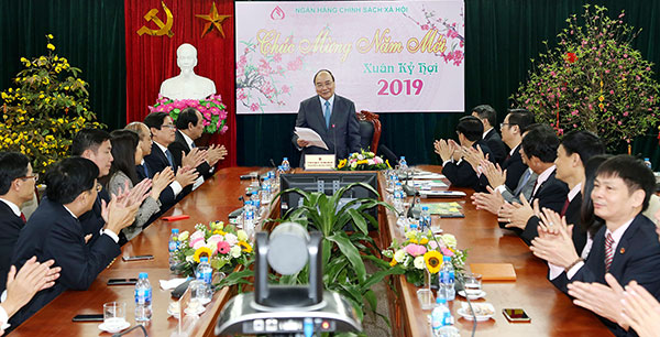 Thủ tướng Nguyễn Xuân Phúc phát biểu tại buổi chúc Tết và làm việc với NHCSXH