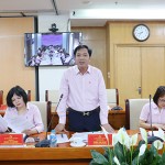 Phó Tổng Giám đốc Vương Văn Minh - Chủ tịch Hội đồng nghiệm thu NHCSXH chủ trì tại điểm cầu trực tuyến Hội sở chính