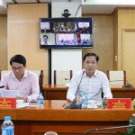 Phó Tổng Giám đốc Vương Văn Minh - Chủ tịch Hội đồng nghiệm thu NHCSXH chủ trì tại điểm cầu trực tuyến Hội sở chính