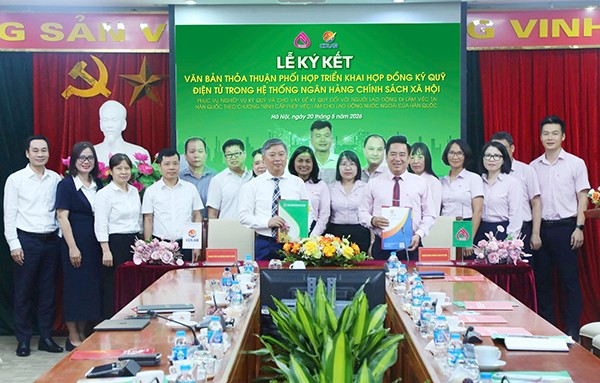 Ký kết văn bản thỏa thuận giữa NHCSXH và Trung tâm lao động ngoài nước